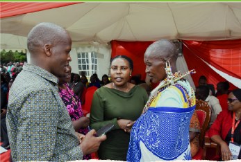 Foundation representatives speaking with community elders