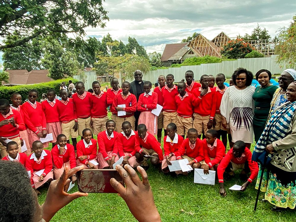 School children in uniform at a community environmental programme