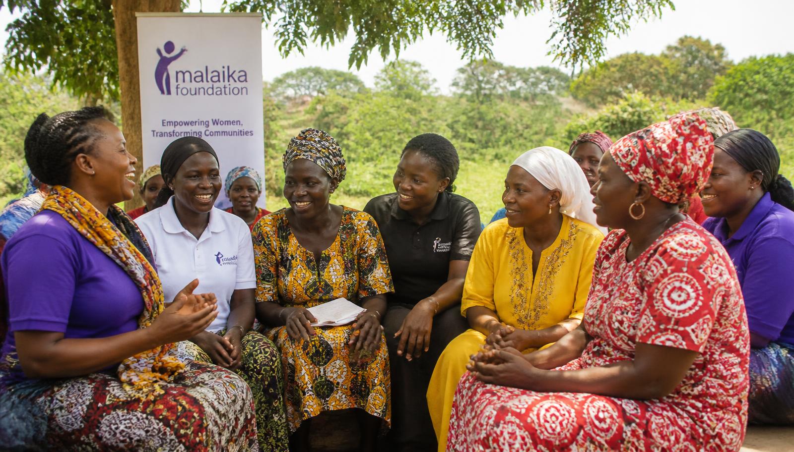 Community members in traditional dress at a foundation event